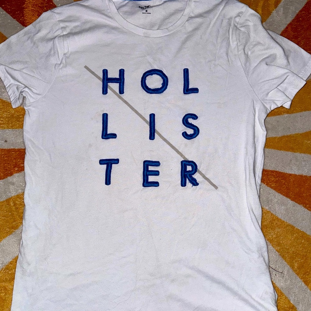 White and blue Hollister shirt.